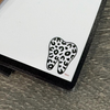 Yellow leopard tooth notepad from Teeth Obsessed, featuring a playful tooth design and magnetic back for easy attachment.