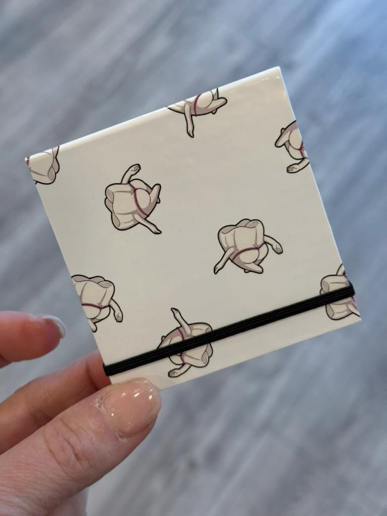 Mrs Flossy Dental Notepad with notes and magnet from Teeth Obsessed, featuring playful dental-themed illustrations.