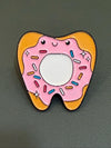 Cute Kawaii Tooth Enamel Pins from Teeth Obsessed, featuring playful, colorful tooth designs on shirts and accessories.