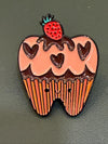 Cute Kawaii Tooth Enamel Pin from Teeth Obsessed, featuring a playful, colorful tooth design on a shirt or pin accessory.