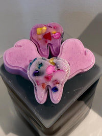 Pink Valentine Tooth Wax Melts from Teeth Obsessed decorated with rocks, designed for freshening and decorative use.