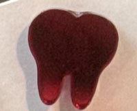 Red Valentine's dental earrings featuring tooth-shaped design from Teeth Obsessed, perfect for unique jewelry lovers.