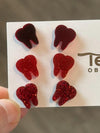 Red Valentine dental earrings featuring tooth-shaped design from Teeth Obsessed, perfect for dental enthusiasts.