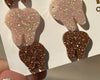 Rose gold dental earrings with Valentine-themed design by Teeth Obsessed, featuring a wide, shiny rose gold finish.